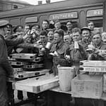 THE BRITISH ARMY IN THE UK: EVACUATION FROM DUNKIRK, MAY-JUNE 1940 (H 1632) Evacuated troops enjoying tea and other refreshments at Addison Road station, London, 31 May 1940. Copyright: © IWM. Original Source: http://www.iwm.org.uk/collections/item/object/205197155