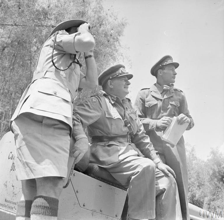 BRITISH ARMY OPERATIONS AGAINST THE MAU MAU IN KENYA 1952 - 1956 (MAU 821) Lieutenant General Sir George Erskine, Commander-in-Chief, East Africa (centre), observing operations against the Mau Mau. In May 1953, General Erskine was given control of all military units plus police and auxiliary troops. Copyright: © IWM. Original Source: http://www.iwm.org.uk/collections/item/object/205191322
