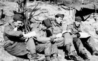 The Intelligence Section from 1st Battalion Duke of Wellington's Regiment looking relaxed and wearing kit typical of the 1952-1953 period, including cap comforters rather than steel helmets. (Sniper Sgt Tom Nowell MM)