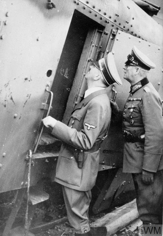 THE GERMAN-SOVIET INVASION OF POLAND, 1939 (MH 13369) Hitler examines destroyed Polish Armoured Train No. 13 'General Sosnkowski' at the town of Lochów, with General Wilhelm Keitel, the Chief of Staff of the OKW (Oberkommando der Wehrmacht), 25 September 1939. The armoured train was seriously damaged by the Luftwaffe on 10 September while covering the retreat of the 'Modlin' Army. Copyright: © IWM. Original Source: http://www.iwm.org.uk/collections/item/object/205194751