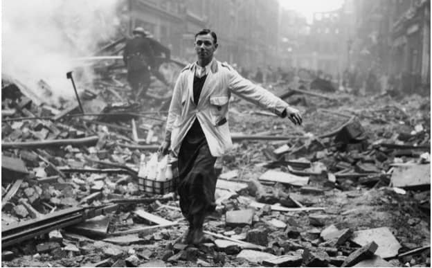 On This Day: 7th September 1940 London Blitz starts
Germany starts it's Blitz on London with 300 German bombers in the first of 57 consecutive nights of bombing. The Blitz caused the deaths of over 40,000 men women and children and left a million homes destroyed in the city. 
A milkman delivering milk in a London street devastated during a German bombing raid. Firemen are dampening down the ruins behind him CREDIT: FRED MORLEY/GETTY IMAGES #WW2